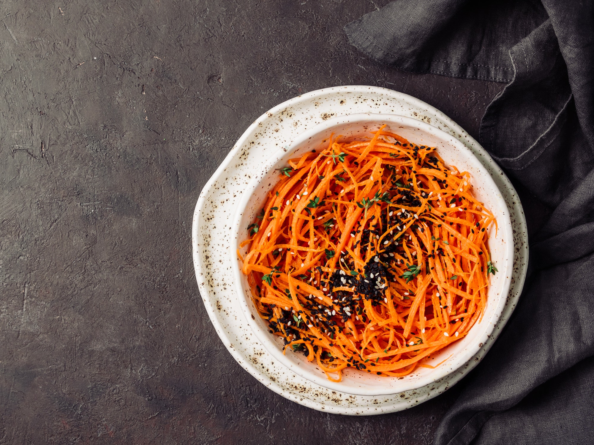 Raw carrot noodles or spaghetti, top view